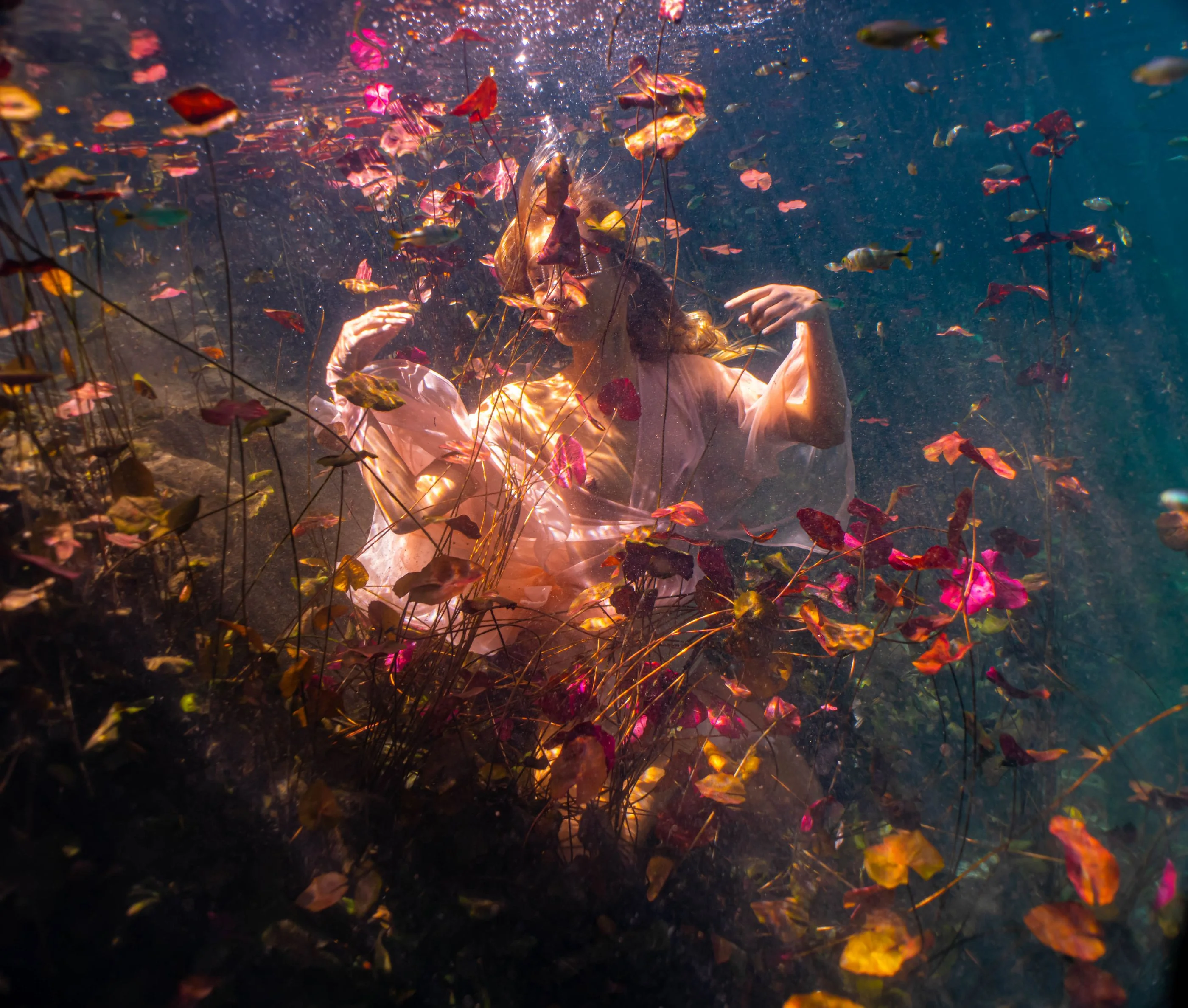 Underwater portrait, fabric unfurling
